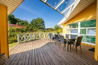 Ein Balkon oder eine Terrasse in der Unterkunft Strandblick - Dorf 1 Ferienhaus 05