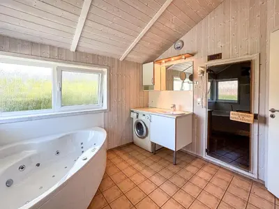 Ein Badezimmer in der Unterkunft Strandblick - Dorf 1 Ferienhaus 04