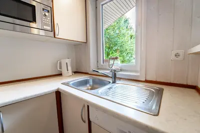Küche/Küchenzeile in der Unterkunft Strandblick - Dorf 1 Ferienhaus 02
