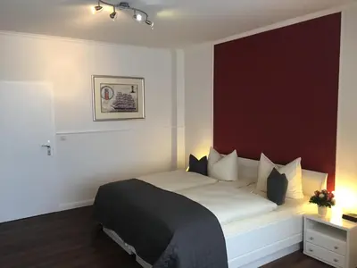 Ein Bett oder Betten in einem Zimmer der Unterkunft Hotel Sonnenklause