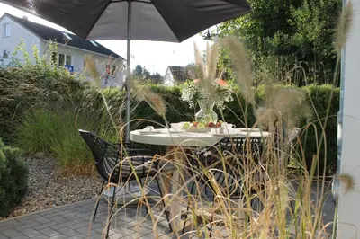 Ein Garten an der Unterkunft Ferienwohnung Alter Sandweg inklusive Strandkorb