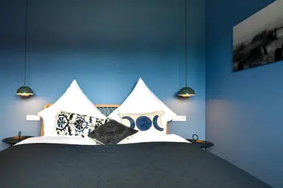 Ein Bett oder Betten in einem Zimmer der Unterkunft Schöne Aussicht Rosenhagen Haus 6