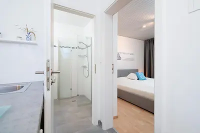 Ein Bett oder Betten in einem Zimmer der Unterkunft Treibholz