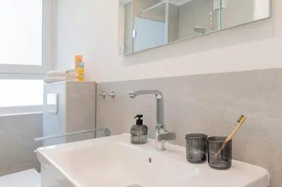 Ein Badezimmer in der Unterkunft Ferienwohnung Wellenbrecher Niendorf