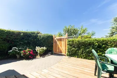 Ein Garten an der Unterkunft Ferienhaus Haffwiese - Haffkrug