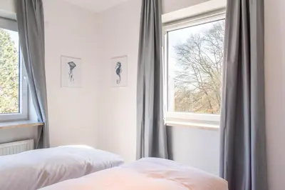 Ein Bett oder Betten in einem Zimmer der Unterkunft Ferienwohnung Hummer Scharbeutz