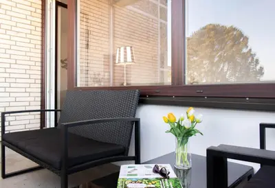 Ein Sitzbereich in der Unterkunft Ferienwohnung Hummer Scharbeutz