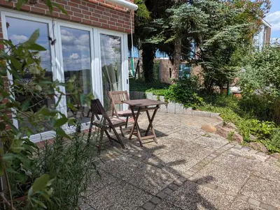 Ein Garten an der Unterkunft Ferien am See
