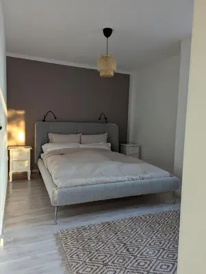 Ein Bett oder Betten in einem Zimmer der Unterkunft Ferien am See