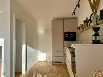 Küche/Küchenzeile in der Unterkunft Wohnung Nordwind - Meerblick & private Sauna