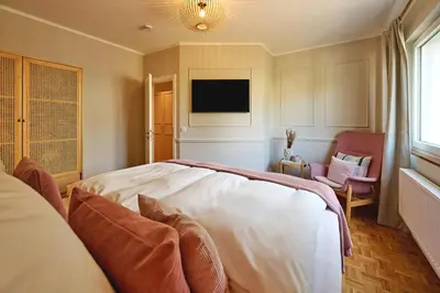 Ein Bett oder Betten in einem Zimmer der Unterkunft Lykke Hus - Traumhaus für bis zu 10 Personen