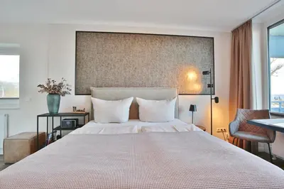 Ein Bett oder Betten in einem Zimmer der Unterkunft Seetempel Appartement 26 