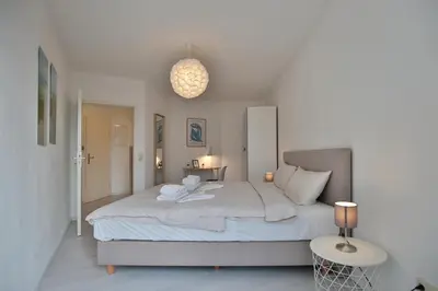 Ein Bett oder Betten in einem Zimmer der Unterkunft Maison Baltique Niendorf Appartement Shoreline Haven 2