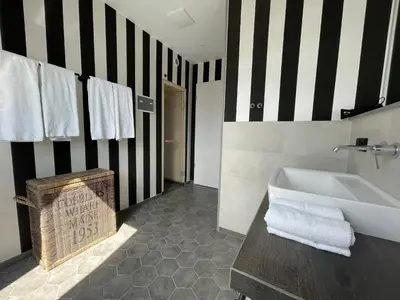 Ein Bett oder Betten in einem Zimmer der Unterkunft 4Hafenzeiten - NIE9 Lotte
