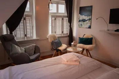 Ein Bett oder Betten in einem Zimmer der Unterkunft PEMATRA Ferienwohnung Mathias Huus