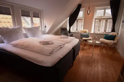 Ein Bett oder Betten in einem Zimmer der Unterkunft PEMATRA Ferienwohnung Mathias Huus