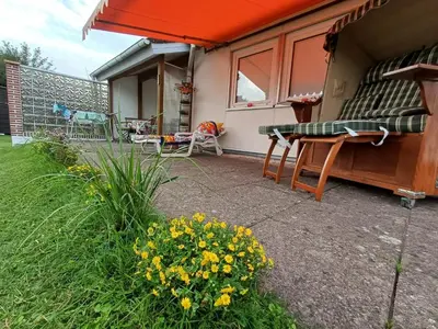 Ein Garten an der Unterkunft Ferien-Bungalow Wiesenweg