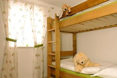 Ein Bett oder Betten in einem Zimmer der Unterkunft Ferienhaus 