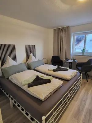 Ein Bett oder Betten in einem Zimmer der Unterkunft Ankerplatz