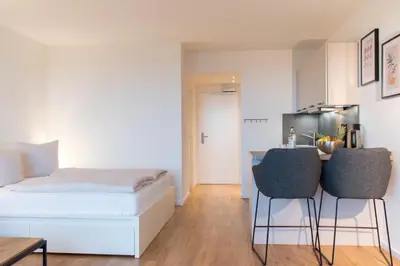 Ein Bett oder Betten in einem Zimmer der Unterkunft Ferienwohnung Residenz App. 116 Timmendorfer Strand