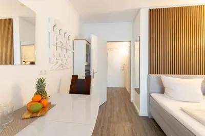 Ein Bett oder Betten in einem Zimmer der Unterkunft Ferienwohnung Residenz App. 101 Timmendorfer Strand