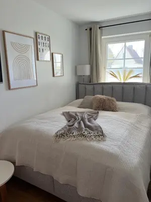 Ein Bett oder Betten in einem Zimmer der Unterkunft Cosy Dream Scharbeutz
