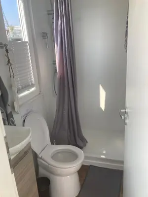 Ein Badezimmer in der Unterkunft HausboootHL