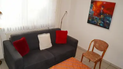 Ein Sitzbereich in der Unterkunft Ferienwohnung Schlichting