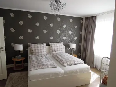 Ein Bett oder Betten in einem Zimmer der Unterkunft Ferienwohnung Ein Zuhause auf Zeit