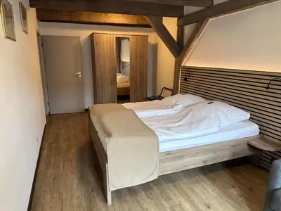 Ein Bett oder Betten in einem Zimmer der Unterkunft Brauberger´s Ferienwohnung