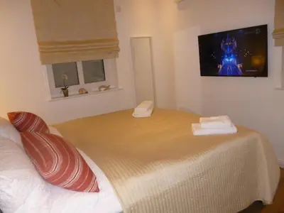 Ein Bett oder Betten in einem Zimmer der Unterkunft 2 Ostsee-Wellnesslandhäuser Sauna, Dampfbad, Jacuzzi