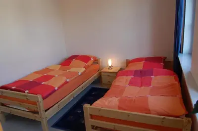 Ein Bett oder Betten in einem Zimmer der Unterkunft Gemütliche Ferienwohnung für 4 Personen