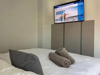 Ein Bett oder Betten in einem Zimmer der Unterkunft Villa Kleine Auszeit