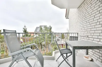 Ein Balkon oder eine Terrasse in der Unterkunft Strandschlößchen Strandschlösschen Appartement 27