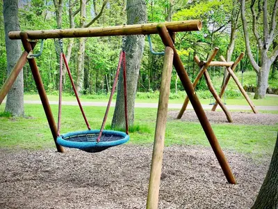 Ein Kinderspielbereich in der Unterkunft FeWo PANORAMADECK Familien-strandnah-Garten-Hunde-Sport-und Schwimmbadnah-HansaPark