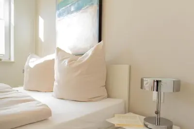 Ein Bett oder Betten in einem Zimmer der Unterkunft Ferienwohnung Passat