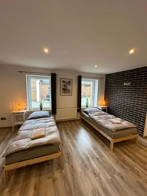 Ein Bett oder Betten in einem Zimmer der Unterkunft Landhof Schadehorn 