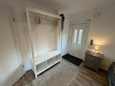 Ein Bett oder Betten in einem Zimmer der Unterkunft Landhof Schadehorn 