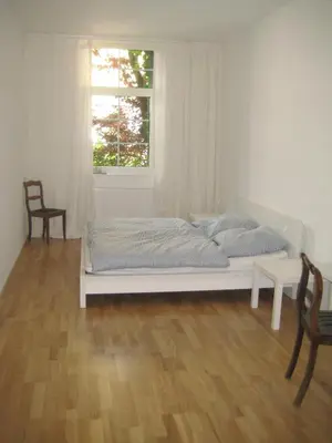 Ein Bett oder Betten in einem Zimmer der Unterkunft Ferienwohnung Lübeck Falkenwiese