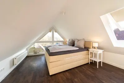 Ein Bett oder Betten in einem Zimmer der Unterkunft Ferienwohnung Coasty - Timmendorfer Strand