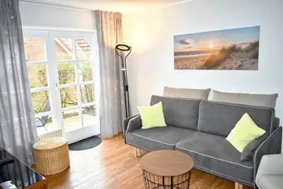 Ein Sitzbereich in der Unterkunft Am Rosenhain 14 Ferienwohnung Nr 01