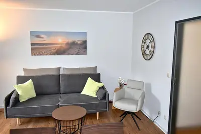 Ein Sitzbereich in der Unterkunft Am Rosenhain 14 Ferienwohnung Nr 01