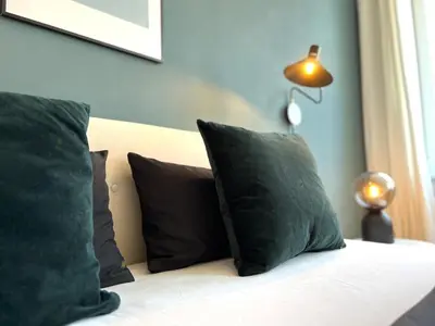 Ein Bett oder Betten in einem Zimmer der Unterkunft Boutique Apartment im charmanten Altbau
