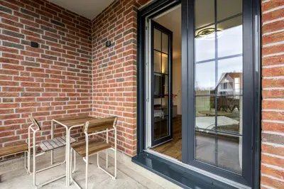 Ein Balkon oder eine Terrasse in der Unterkunft Ferienwohnung Strandhafer Rosenhagen bei Travemünde