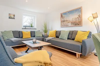Ein Sitzbereich in der Unterkunft Lüttge Hus