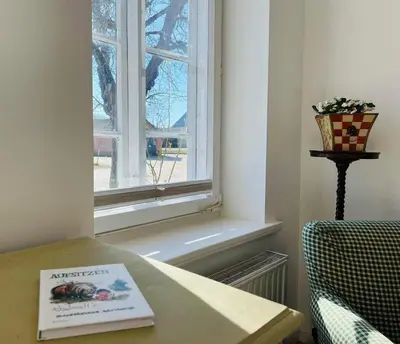 Ein Sitzbereich in der Unterkunft Glasauer Kutscherhaus