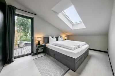 Ein Bett oder Betten in einem Zimmer der Unterkunft My Baltic Sea - Ferienwohnung Sea Shell