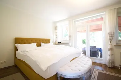 Ein Bett oder Betten in einem Zimmer der Unterkunft Perle 2 Niendorf