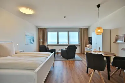 Ein Bett oder Betten in einem Zimmer der Unterkunft Haus Seebrücke Appartement 9