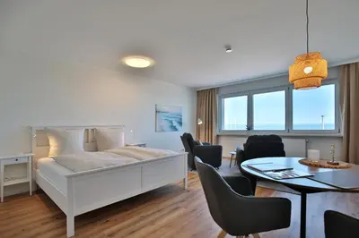 Ein Bett oder Betten in einem Zimmer der Unterkunft Haus Seebrücke Appartement 9